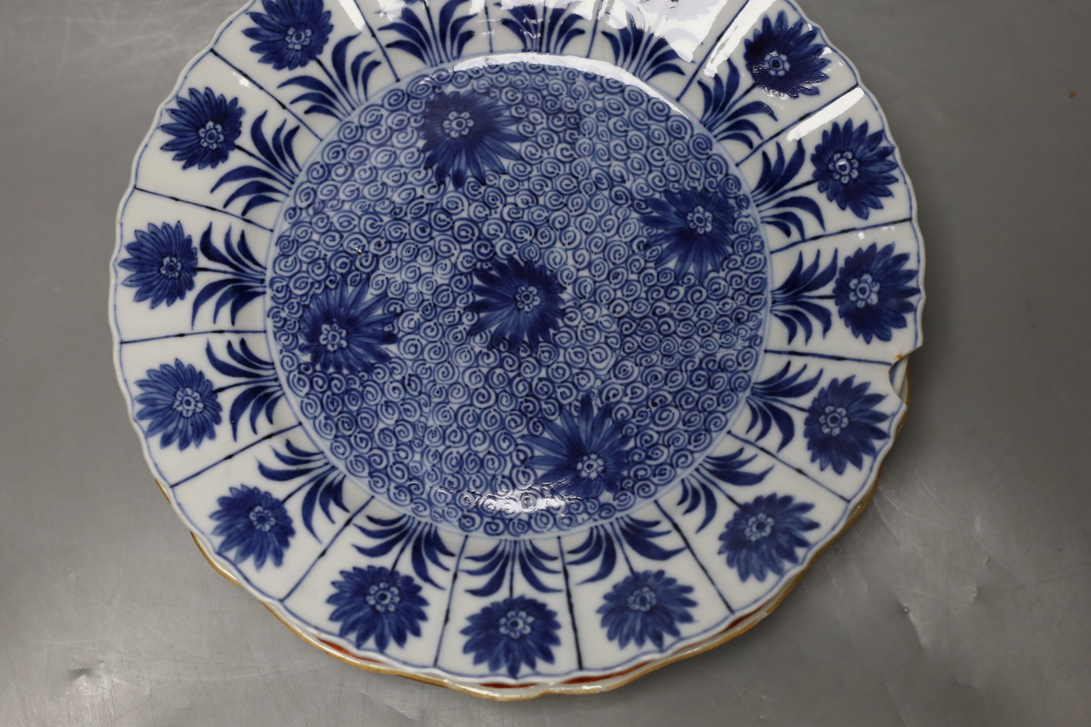 A group of 18th / 19th century Chinese blue and white plates and bowls, Largest 22 cm diameter